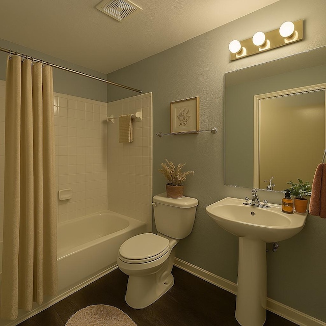 7340 Muffin Dr, Austin, TX 78724 - bathroom with toilet, shower / bath combination with curtain, wood finished floors, and baseboards
