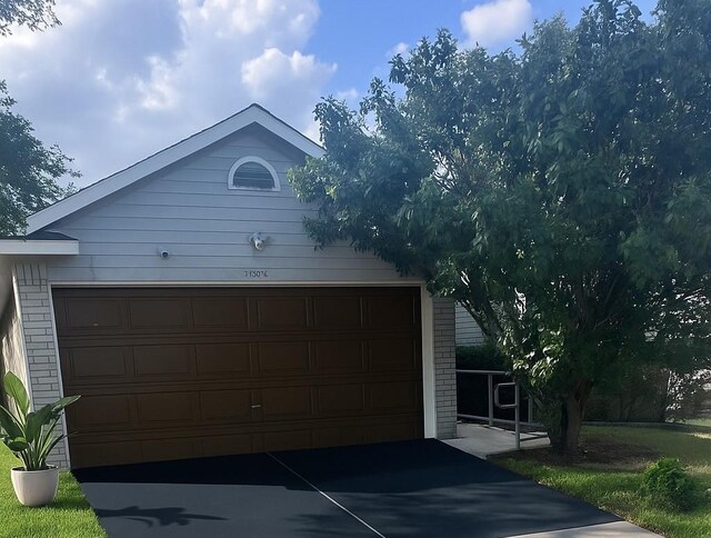7340 Muffin Dr, Austin, TX 78724 - view of front facade with a garage