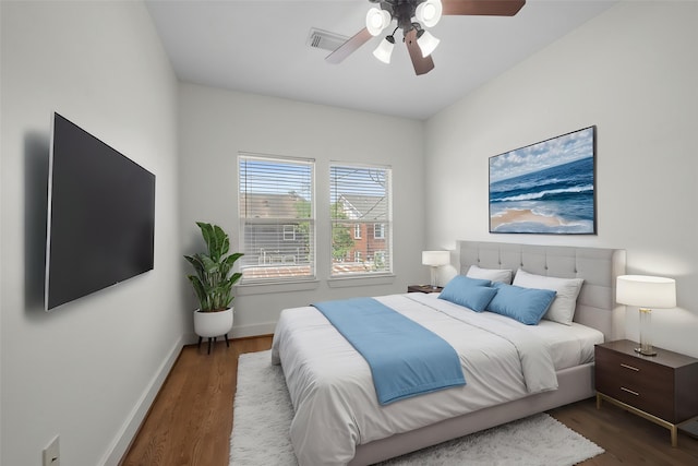 1226 Peden St, Houston, TX 77006 - bedroom featuring wood finished floors, baseboards, and ceiling fan