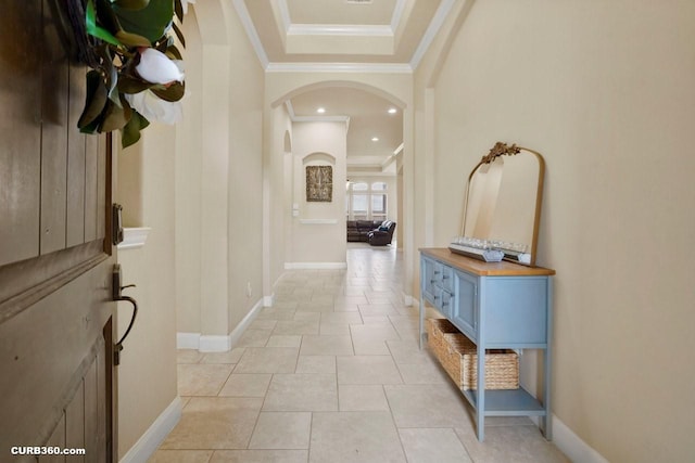 1522 Richland Hollow Ln, Friendswood, TX 77546 - hall featuring arched walkways, crown molding, baseboards, a tray ceiling, and recessed lighting