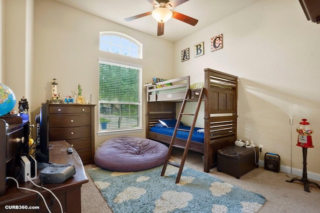 1522 Richland Hollow Ln, Friendswood, TX 77546 - carpeted bedroom with baseboards and a ceiling fan