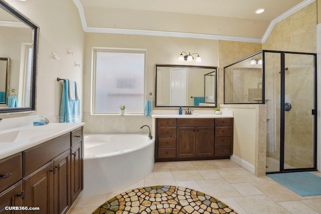 1522 Richland Hollow Ln, Friendswood, TX 77546 - full bathroom with a garden tub, a shower stall, two vanities, ornamental molding, and tile patterned floors