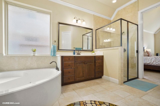 1522 Richland Hollow Ln, Friendswood, TX 77546 - full bathroom featuring crown molding, vanity, a shower stall, a whirlpool tub, and ensuite bathroom