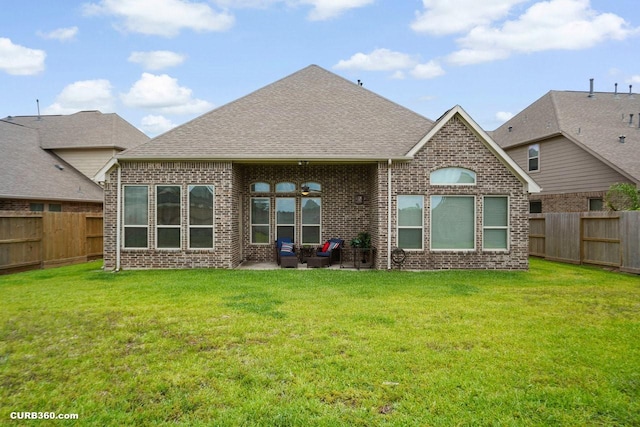 1522 Richland Hollow Ln, Friendswood, TX 77546 - rear view of property with brick siding, a shingled roof, and a patio area