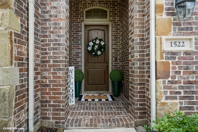 1522 Richland Hollow Ln, Friendswood, TX 77546 - view of exterior entry with brick siding