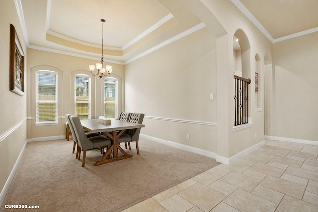 1522 Richland Hollow Ln, Friendswood, TX 77546 - dining space with ornamental molding, a chandelier, light colored carpet, baseboards, and a raised ceiling