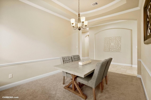 1522 Richland Hollow Ln, Friendswood, TX 77546 - tiled dining area featuring carpet, a chandelier, arched walkways, ornamental molding, and a tray ceiling