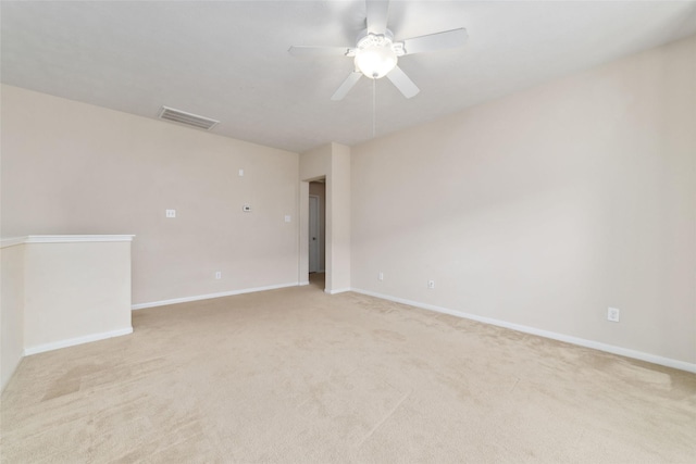 24526 Carlton Springs Ln, Katy, TX 77494 - empty room featuring ceiling fan, light carpet, and baseboards