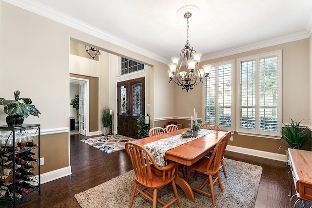5702 Mustang Ridge Ln, Fulshear, TX 77441 - dining area featuring ornamental molding, healthy amount of natural light, a chandelier, and dark wood-style flooring