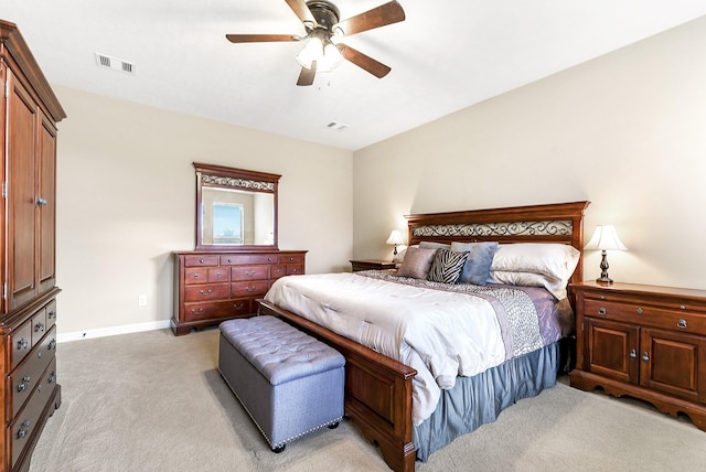 5702 Mustang Ridge Ln, Fulshear, TX 77441 - bedroom featuring light colored carpet, baseboards, and a ceiling fan