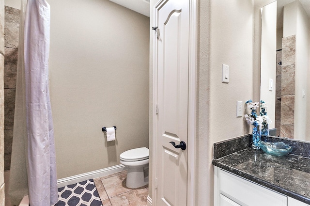 5702 Mustang Ridge Ln, Fulshear, TX 77441 - bathroom with vanity, toilet, baseboards, tile patterned floors, and curtained shower