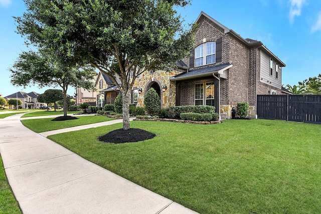 5702 Mustang Ridge Ln, Fulshear, TX 77441 - view of front of property with brick siding and stone siding