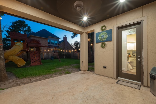 105 Checkerbloom Ct, Montgomery, TX 77316 - view of patio / terrace featuring a playground