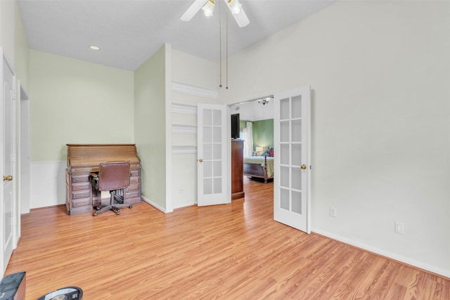 17503 Whispering Star Ct, Houston, TX 77095 - unfurnished office featuring french doors, wood finished floors, baseboards, and a ceiling fan