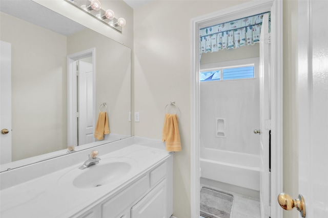 17503 Whispering Star Ct, Houston, TX 77095 - bathroom featuring vanity and bathing tub / shower combination