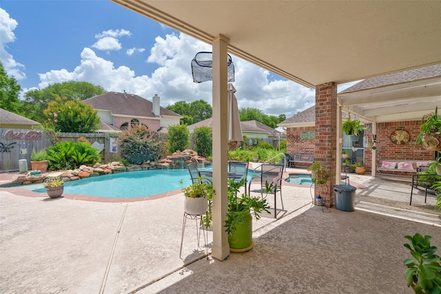 17503 Whispering Star Ct, Houston, TX 77095 - view of pool featuring a patio and a fenced backyard
