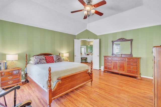 17503 Whispering Star Ct, Houston, TX 77095 - bedroom with light wood-style flooring, crown molding, vaulted ceiling, baseboards, and wallpapered walls