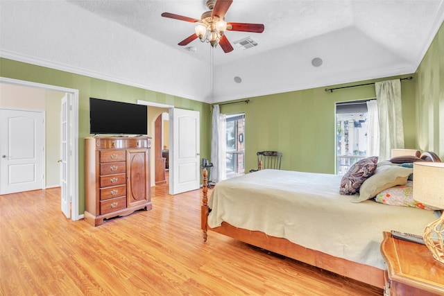 17503 Whispering Star Ct, Houston, TX 77095 - bedroom with light wood-style flooring, ornamental molding, and ceiling fan