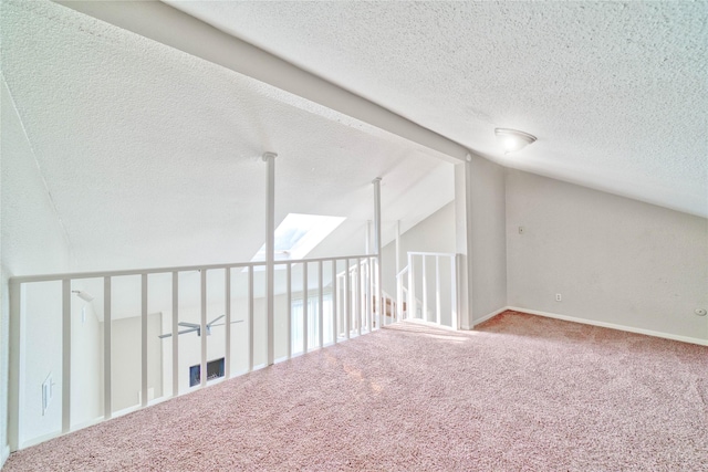 11415 Pepperdine Ln, Houston, TX 77071 - additional living space with carpet, a textured ceiling, and lofted ceiling