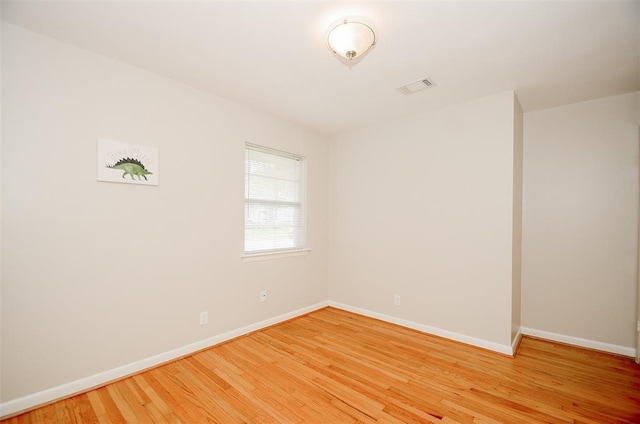 4410 Spellman Rd, Houston, TX 77035 - unfurnished room with baseboards and light wood finished floors