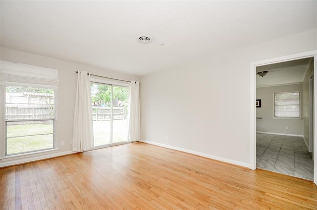 4410 Spellman Rd, Houston, TX 77035 - empty room with light wood finished floors and baseboards
