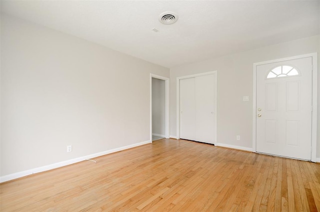 4410 Spellman Rd, Houston, TX 77035 - foyer entrance featuring light wood-style floors and baseboards