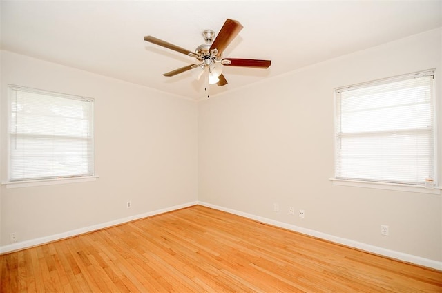 4410 Spellman Rd, Houston, TX 77035 - unfurnished room featuring light wood-style flooring, baseboards, and ceiling fan