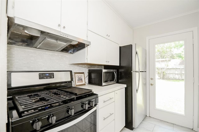 4410 Spellman Rd, Houston, TX 77035 - kitchen featuring stainless steel appliances, ventilation hood, ornamental molding, light countertops, and white cabinetry