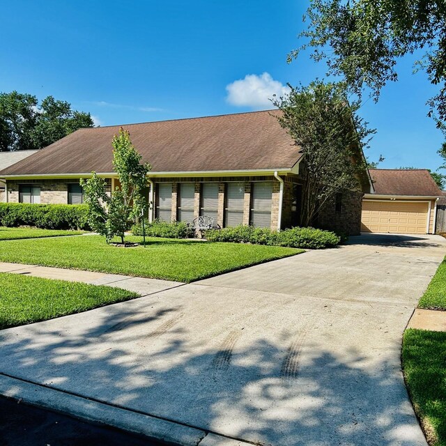 5203 Crystal Bay Dr, Houston, TX 77084 - view of front of property featuring a front lawn and concrete driveway