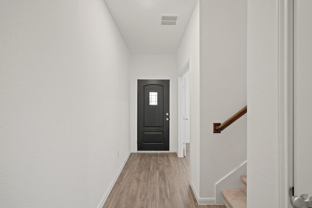 1312 Grass Bend Dr, Katy, TX 77493 - entryway with wood finished floors, baseboards, and stairway