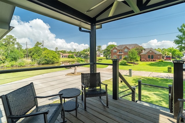719 Fairfield St, Shoreacres, TX 77571 - wooden terrace featuring a lawn