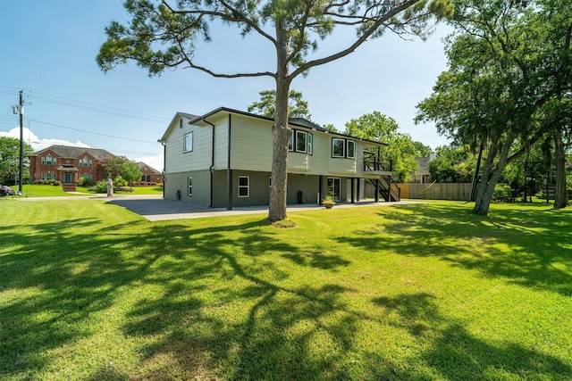 719 Fairfield St, Shoreacres, TX 77571 - rear view of property with stairway and a patio area