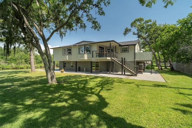 719 Fairfield St, Shoreacres, TX 77571 - back of house with stairway, a patio area, and a deck