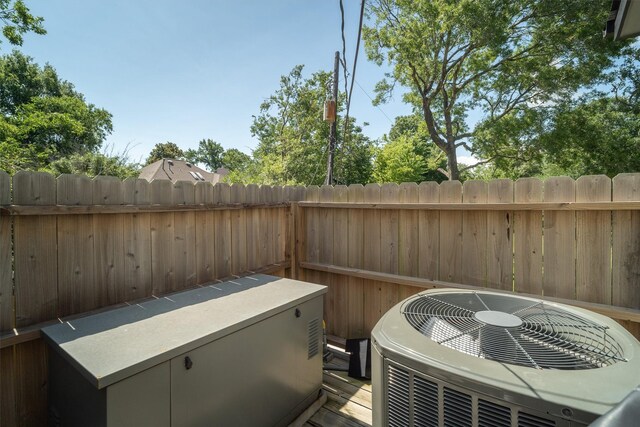 719 Fairfield St, Shoreacres, TX 77571 - view of patio with central AC unit