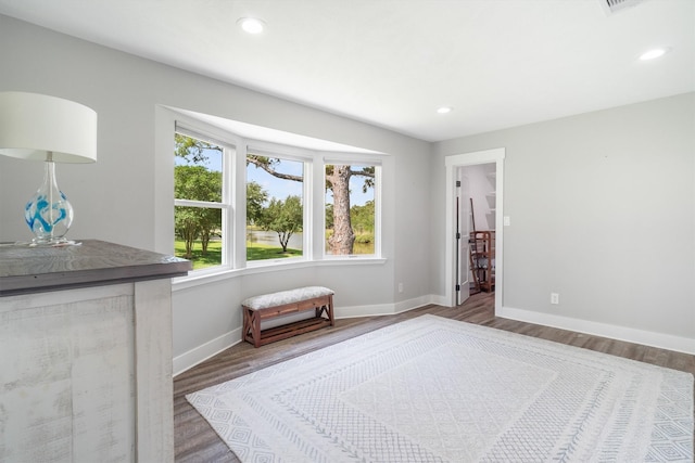 719 Fairfield St, Shoreacres, TX 77571 - bedroom featuring wood finished floors, baseboards, and recessed lighting
