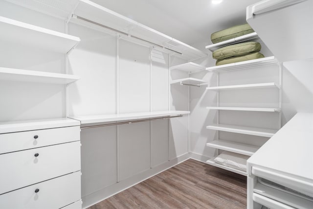 719 Fairfield St, Shoreacres, TX 77571 - walk in closet featuring wood finished floors