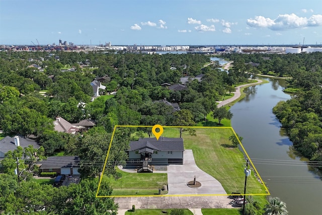 719 Fairfield St, Shoreacres, TX 77571 - view of property location featuring property parcel outlined, a large body of water, and a tree filled landscape