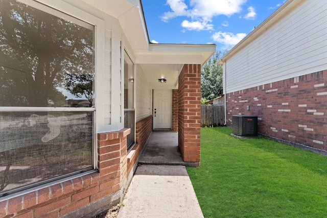 2411 Irish Spring Dr, Houston, TX 77067 - property entrance featuring central AC unit and brick siding