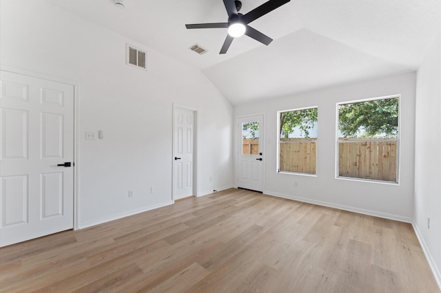 2411 Irish Spring Dr, Houston, TX 77067 - empty room with a ceiling fan, light wood-type flooring, lofted ceiling, and baseboards