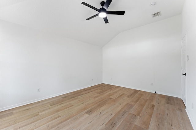 2411 Irish Spring Dr, Houston, TX 77067 - bonus room featuring ceiling fan, vaulted ceiling, light wood-style flooring, and baseboards