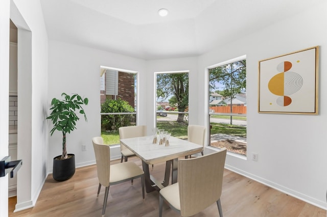 2411 Irish Spring Dr, Houston, TX 77067 - dining area featuring light wood finished floors and baseboards