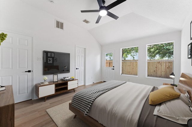 2411 Irish Spring Dr, Houston, TX 77067 - bedroom featuring light wood-type flooring, lofted ceiling, and ceiling fan