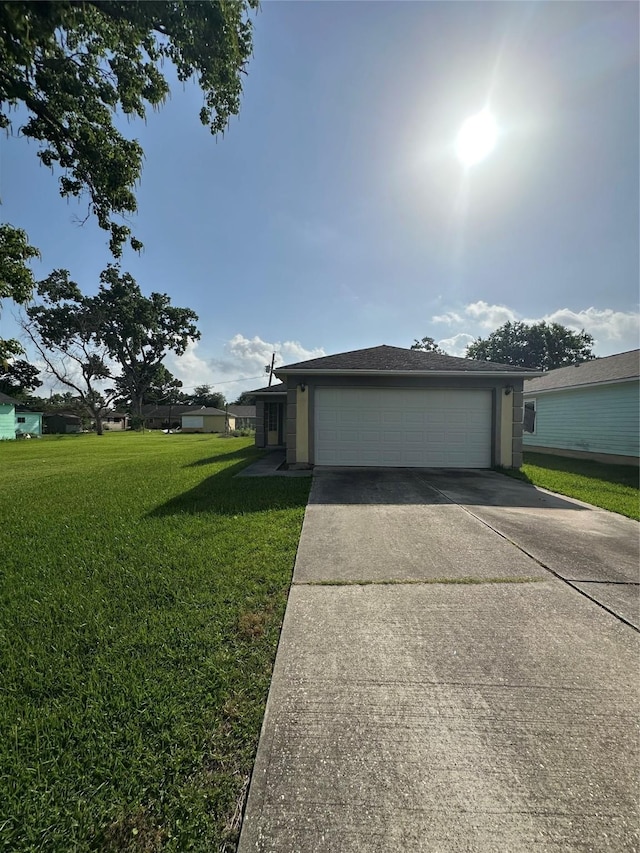 227 S Brownell St, La Porte, TX 77571 - view of front of house with a front lawn and an attached garage