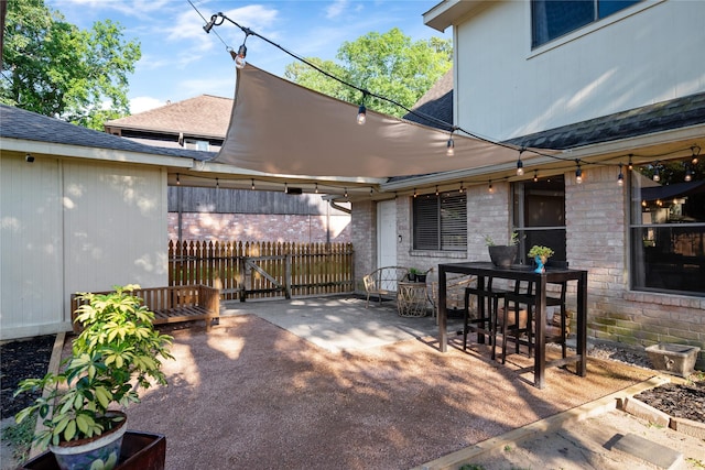 3707 Brook Shadow Dr, Houston, TX 77345 - view of patio / terrace featuring outdoor dining space and a gate
