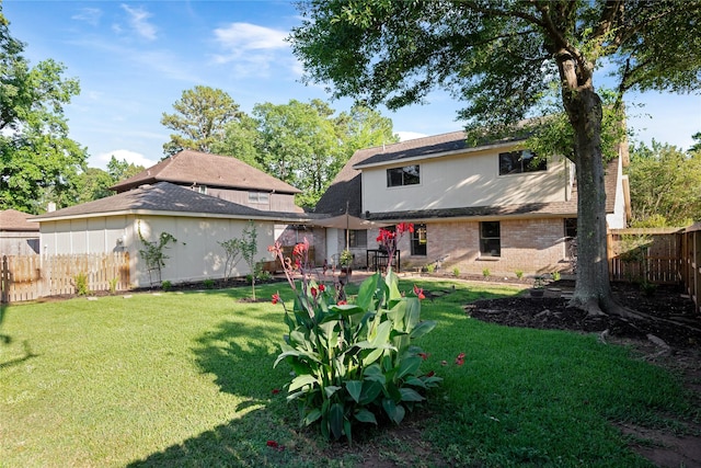 3707 Brook Shadow Dr, Houston, TX 77345 - rear view of house with brick siding