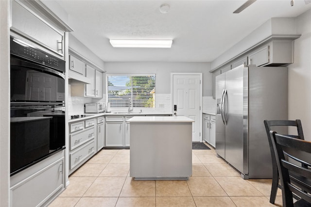 3707 Brook Shadow Dr, Houston, TX 77345 - kitchen featuring stainless steel fridge with ice dispenser, backsplash, a sink, a center island, and light countertops