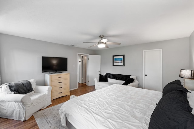 3707 Brook Shadow Dr, Houston, TX 77345 - bedroom featuring wood finished floors and a ceiling fan