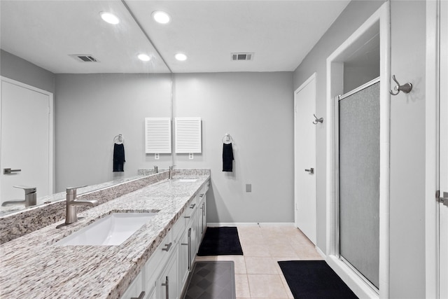 3707 Brook Shadow Dr, Houston, TX 77345 - full bath with double vanity, a shower stall, recessed lighting, tile patterned flooring, and baseboards