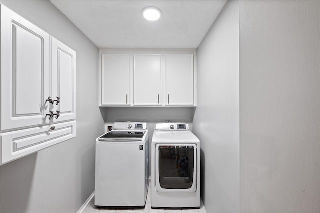 3707 Brook Shadow Dr, Houston, TX 77345 - laundry area featuring cabinet space and washing machine and clothes dryer