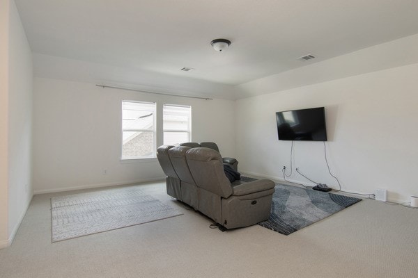 11211 Stirton, Tomball, TX 77375 - carpeted living room featuring baseboards